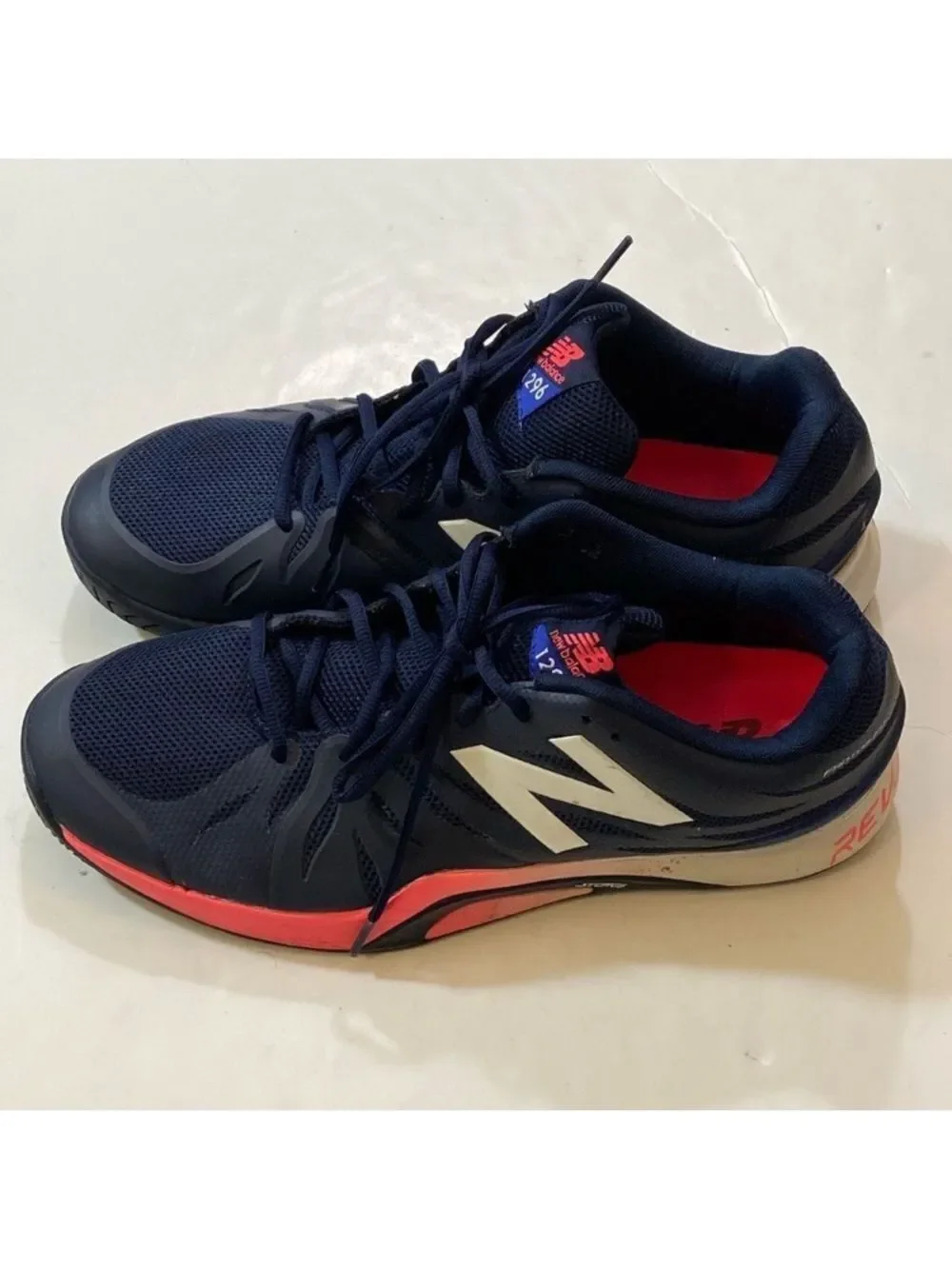 New Balance 1296v2 Men's Navy Athletic Shoes with Coral Accents